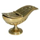 Naveta de bronze com motivos religiosos gravados dourados